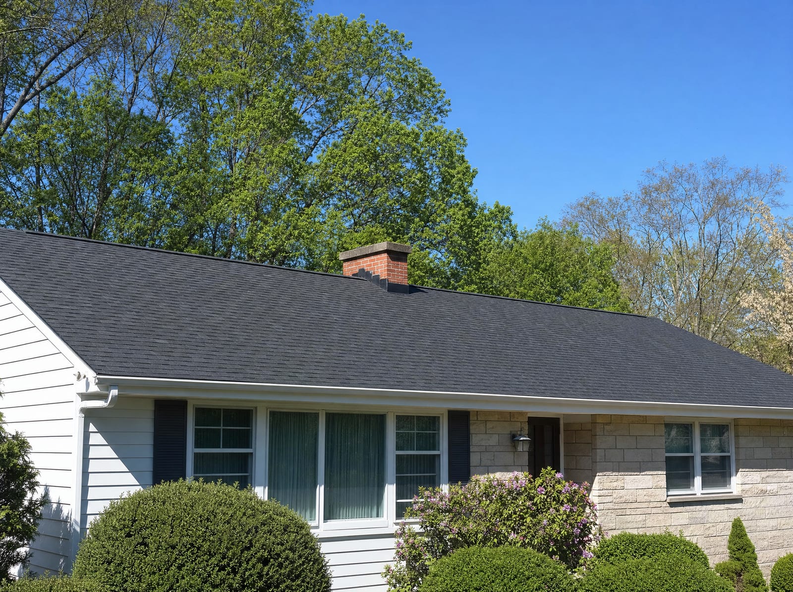 Brand-new architectural shingle roof completed on a Connecticut ranch home