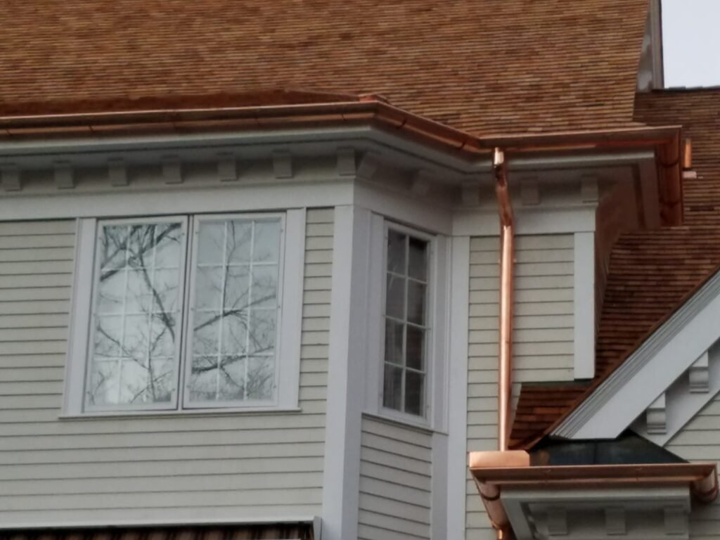 American Quality Roofing and Siding offers the best gutter downspout installation services.